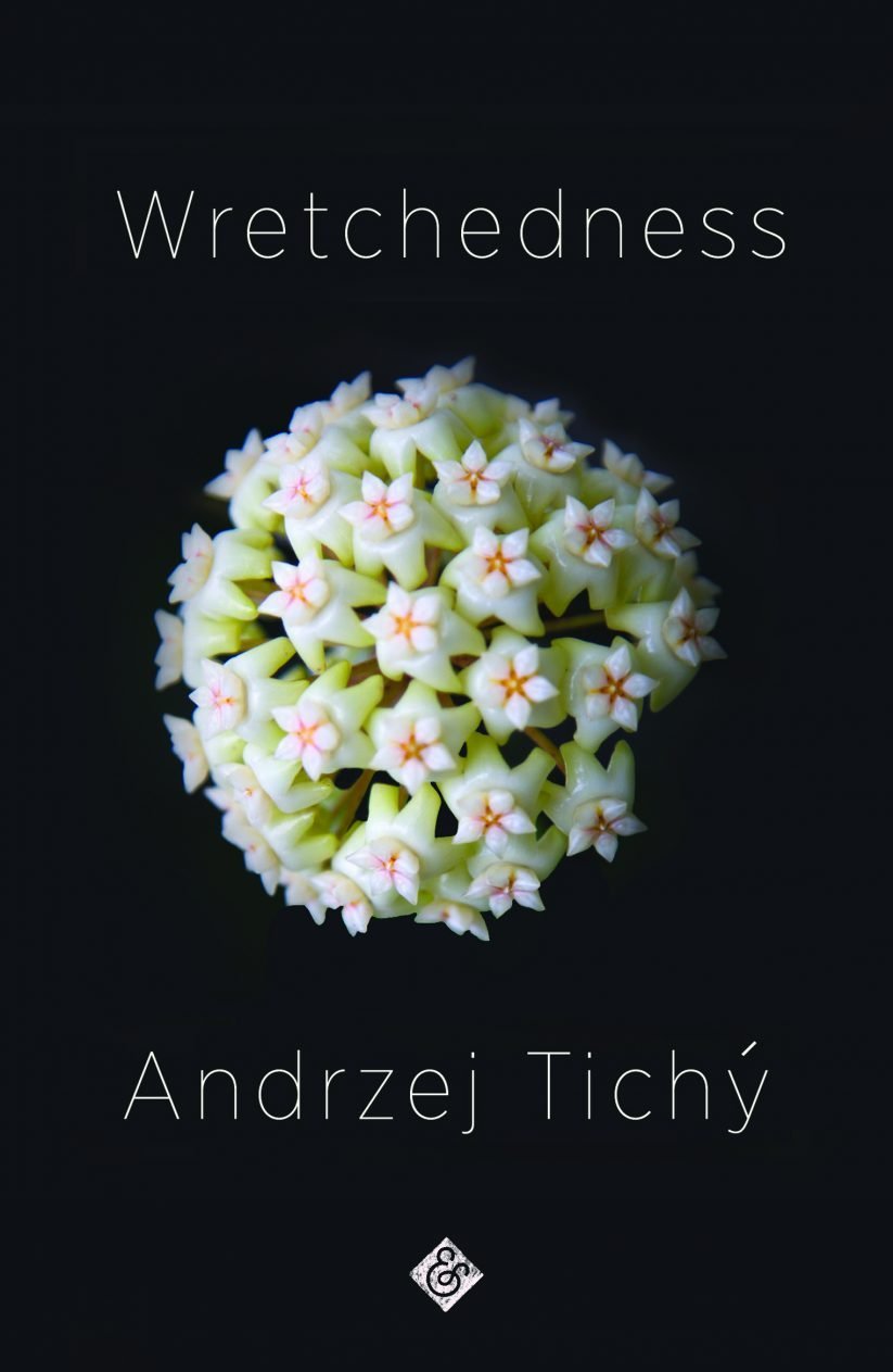 Andrzej Tichy Wretchedness cover - rectangular black cover image with a white hoya flower in the centre